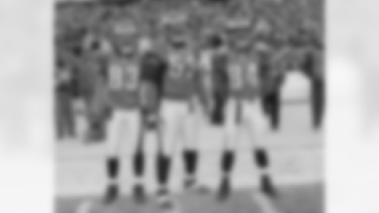 Greg Lewis, Hugh Douglas, and Freddie Mitchell