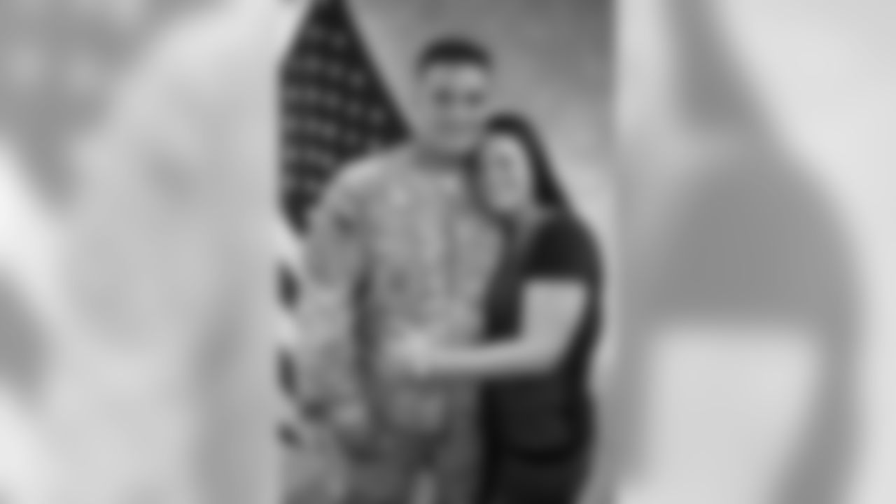TSgt Silmer Antonio Carmona's girlfriend was in on the surprise, helping the USO coordinate details with TSgt Carmona's family