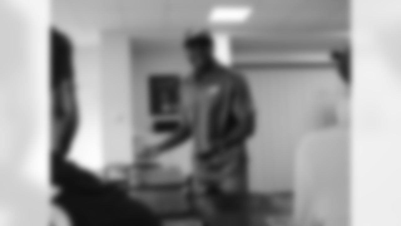 Agholor signing a few pictures for fans in the NovaCare Complex