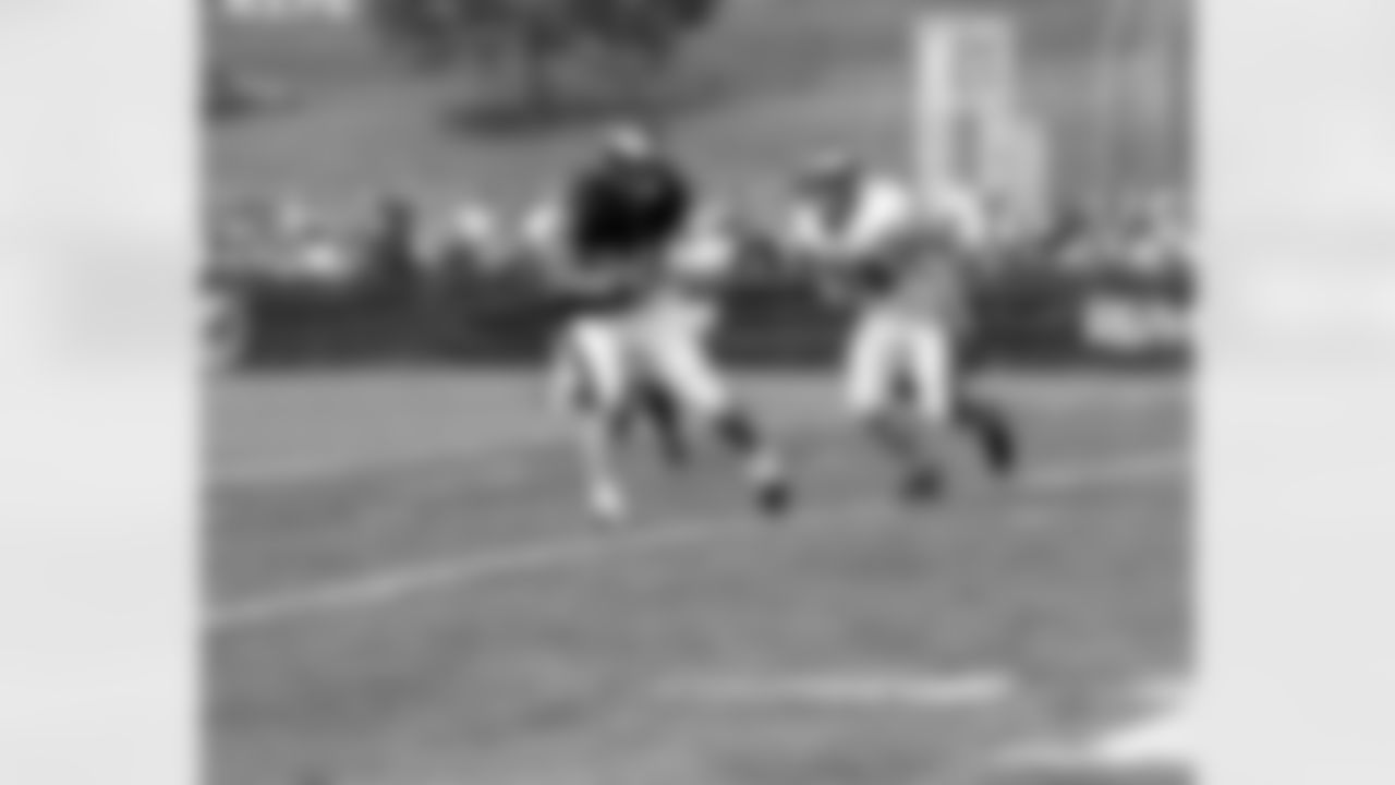 LB Craig Kobel watches as TE Brent Celek hauls in a reception