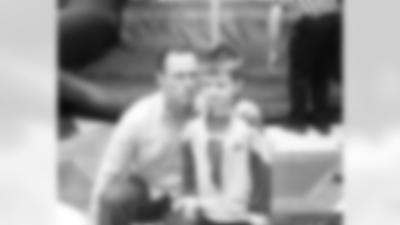 Akers tries to be intimidating during a photo with this young fan