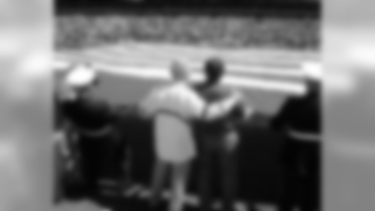 Former head coach Dick Vermeil and the alumni assisted with the field-sized American flag displayed on the field for the National Anthem