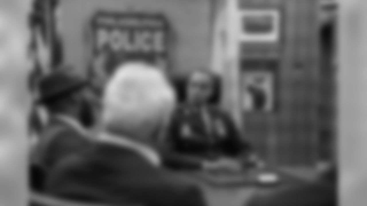Malcolm Jenkins speaks to Ross Jr. and Eagles Chairman and CEO Jeffery Lurie at the Philadelphia Police Department.