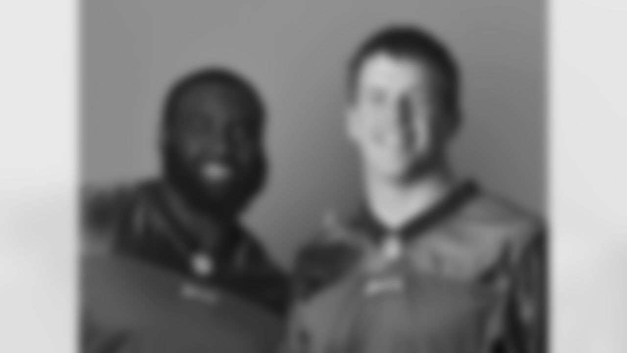 NT Bennie Logan interrupts WR Will Murphy's headshot session