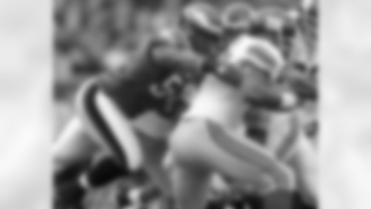 DE Trent Cole makes a play on Giants RB Brandon Jacobs