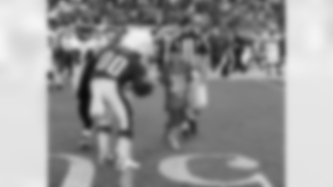 SWOOP greets the coin toss kid