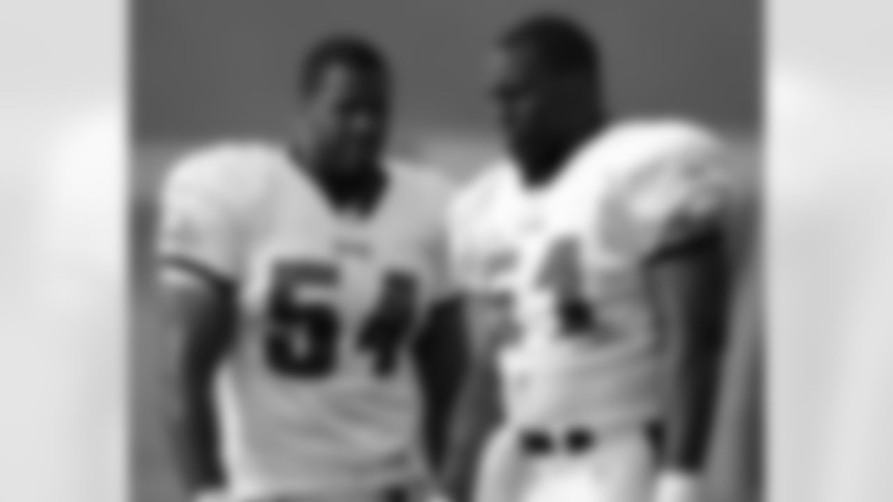 LBs Jeremiah Trotter and Takeo Spikes