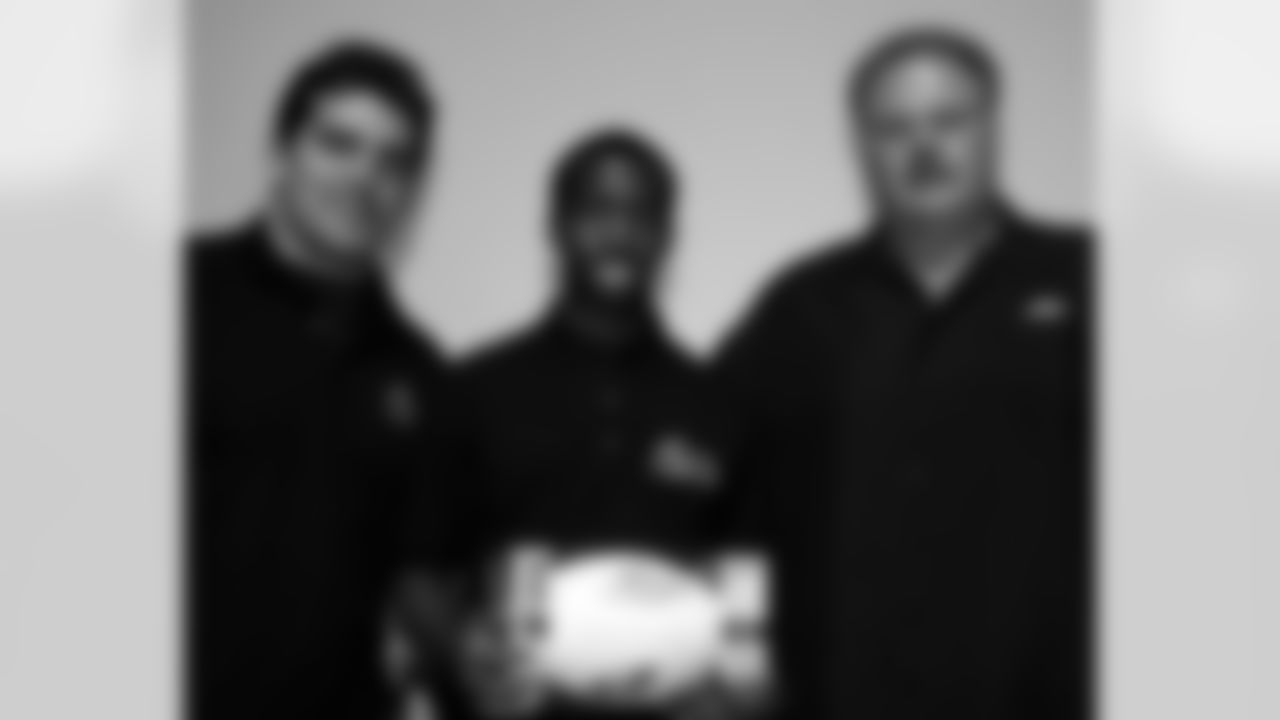 Daniel Wallace of South Philadelphia High School with Andy Reid and Kyle Eckel