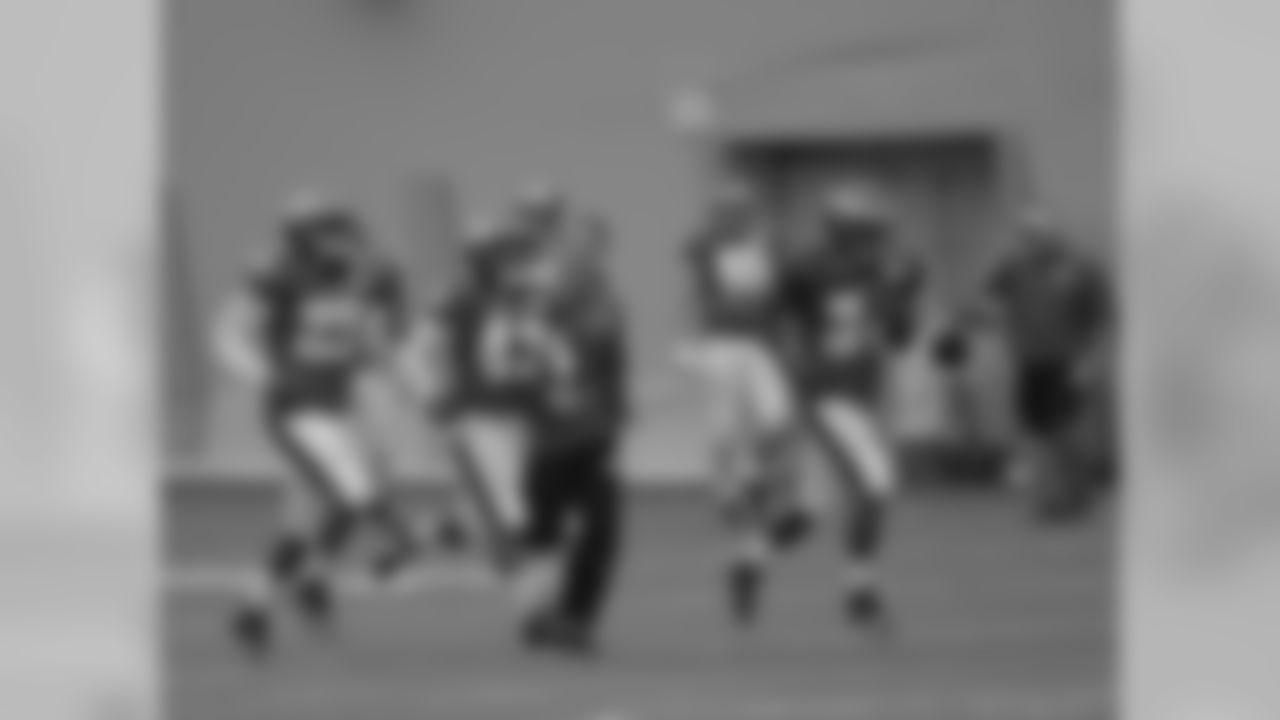 The running backs running out for their drills