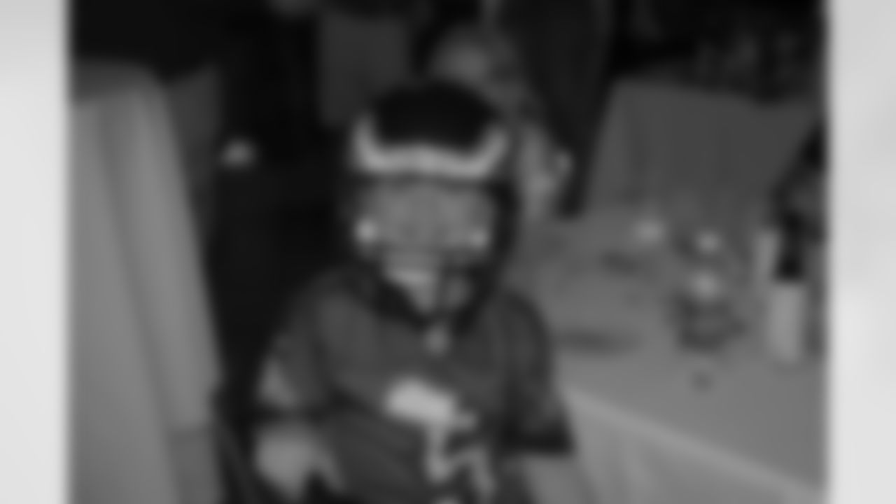 Fan winning his prize and wearing it too