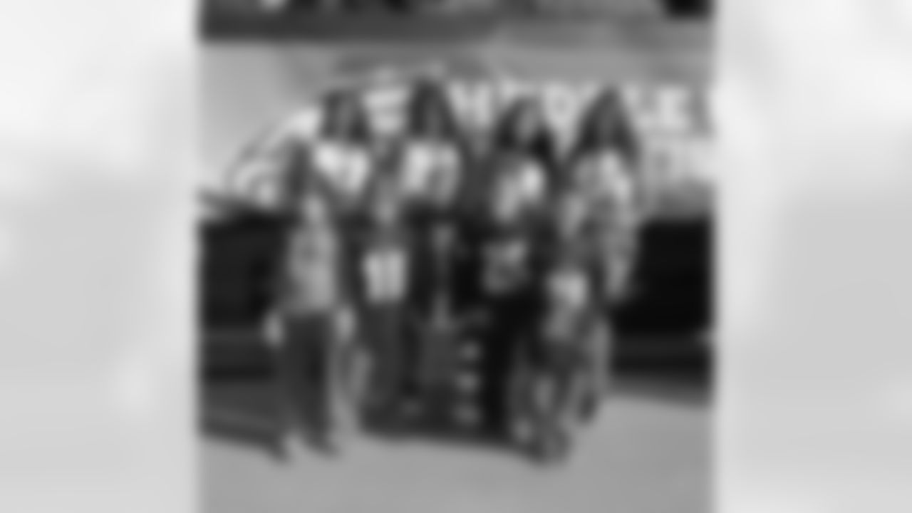 The cheerleaders were excited to meet these young Eagles fans all decked out in their Eagles gear!