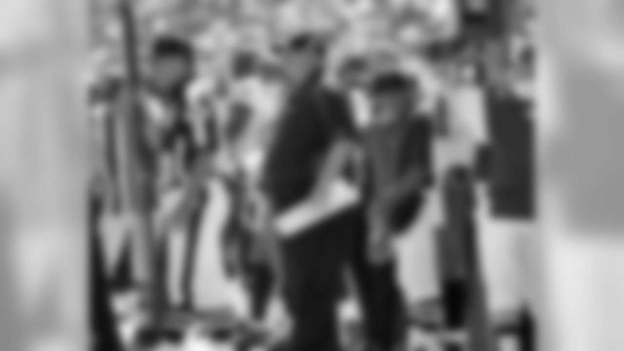 Head coach Andy Reid looks on