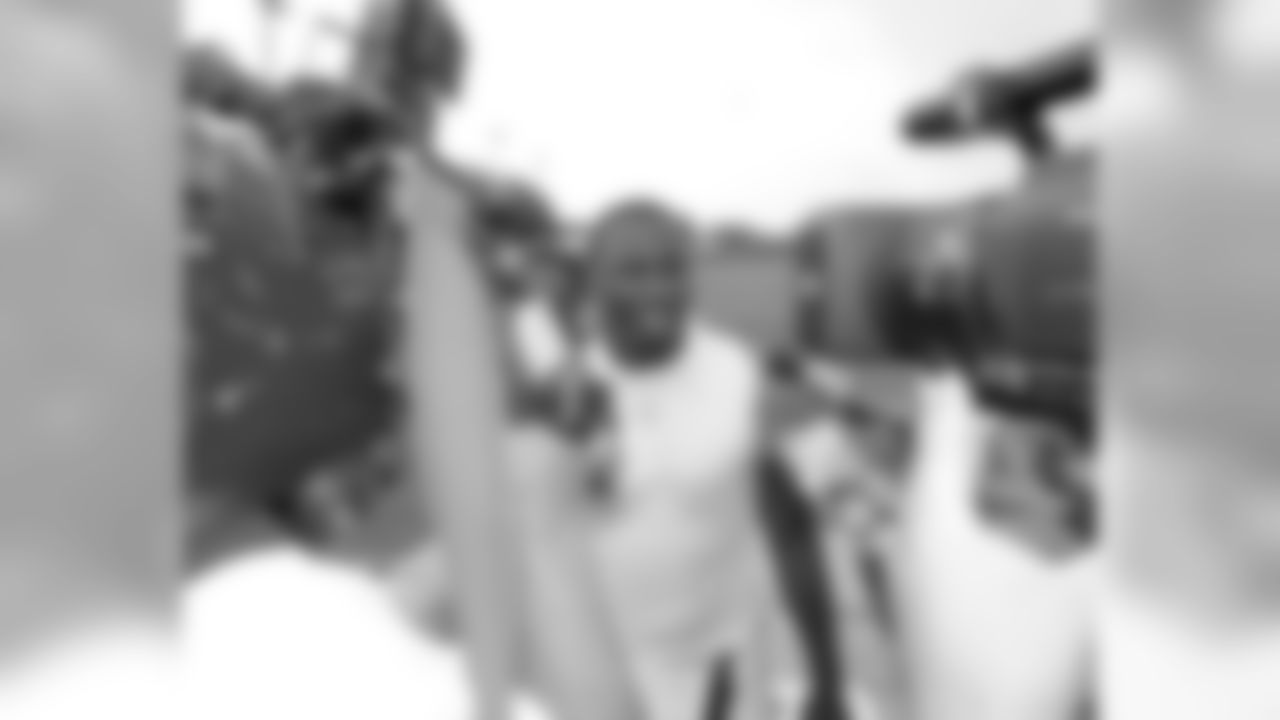 RB LeSean McCoy surrounded by reporters following practice