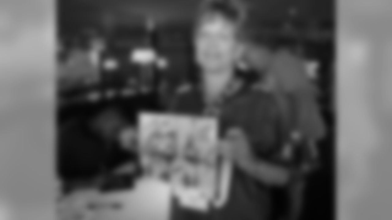 Fan shows off a special photo she had autographed