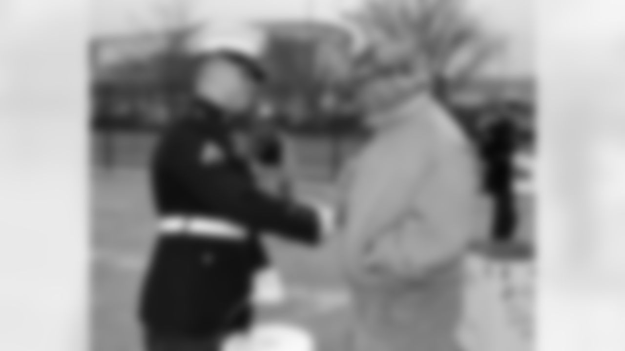 Fan offers thanks to a U.S. Marine