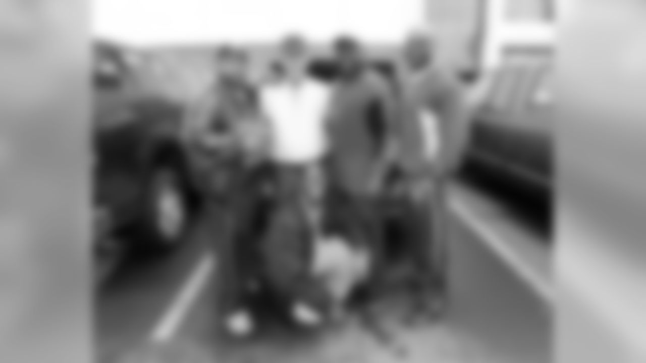 Fans pose for a group photo
