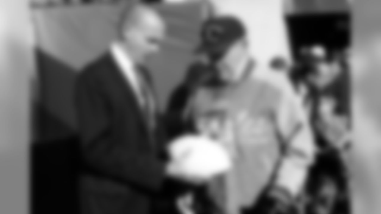 Eagles President Don Smolenski meets with veterans during pregame