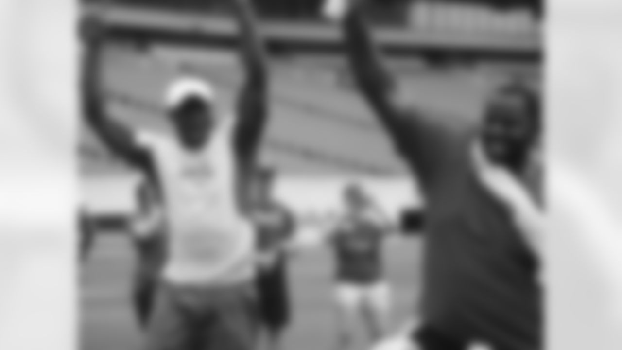 Boykin and Cox celebrate with the kids