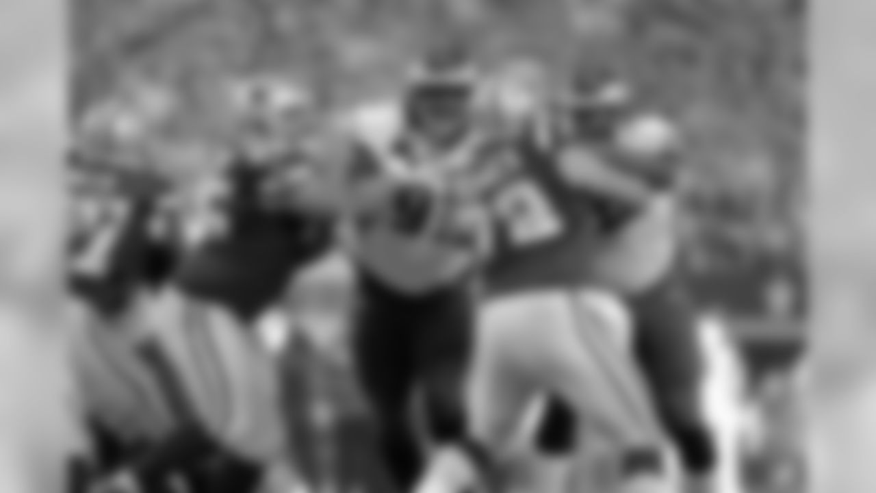 DE Fletcher Cox and DT Benny Logan rushing