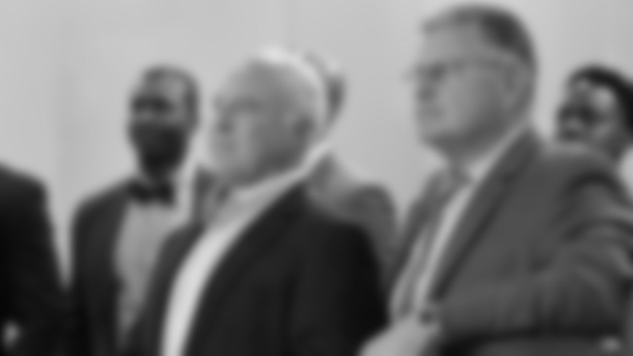 Eagles Chairman and CEO Jeffrey Lurie standing with Offensive line/Run game coordinator Jeff Stoutland