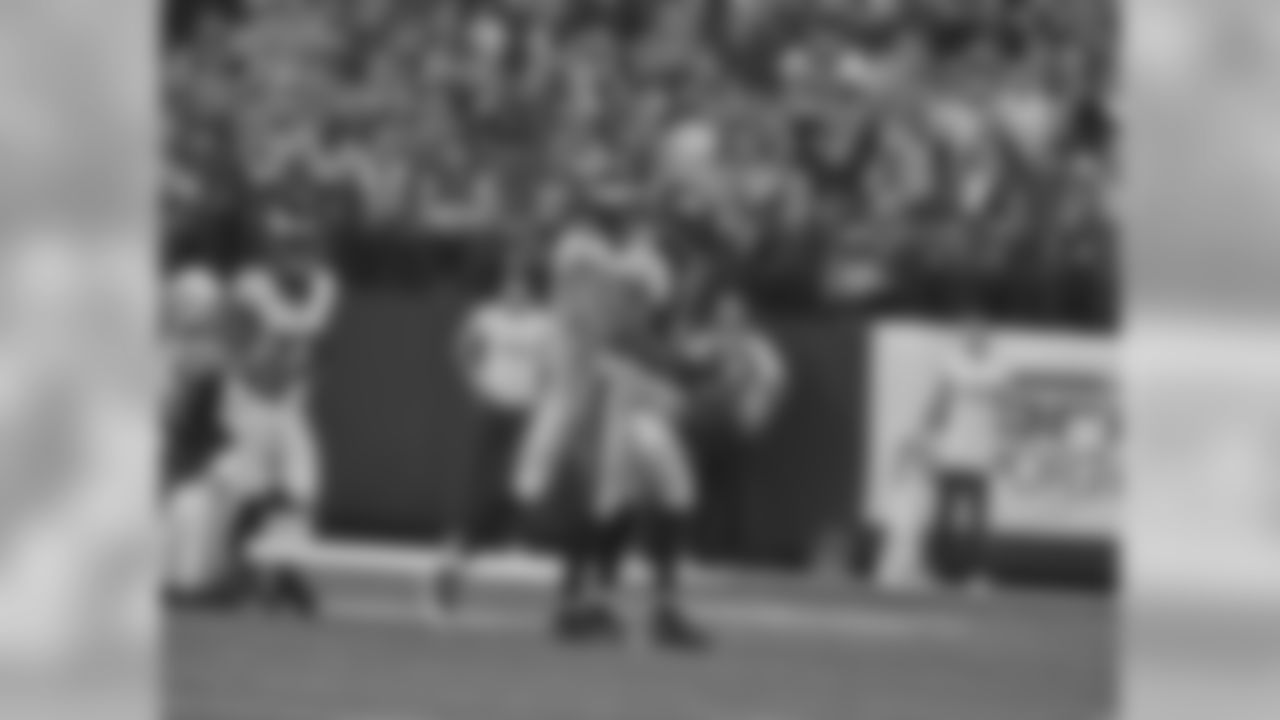 Jenkins celebrates his first interception with his new team.