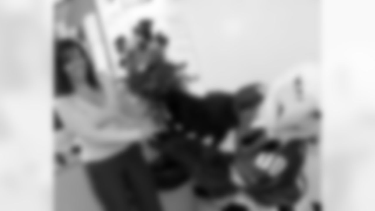 SWOOP presents Renee Kelsey with the bouquet of roses