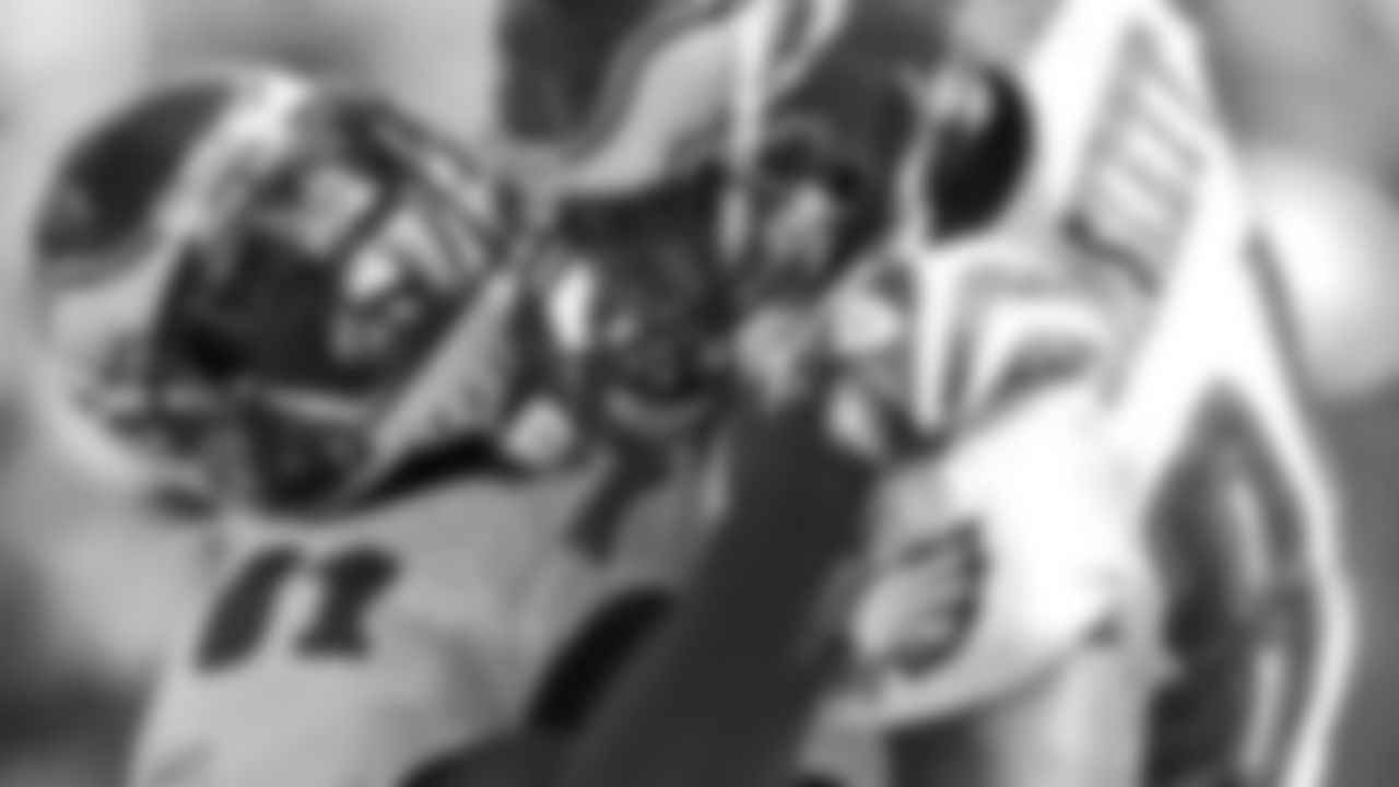 Hank Baskett celebrated his 90-yard receiving touchdown against the Rams with Jason Avant.