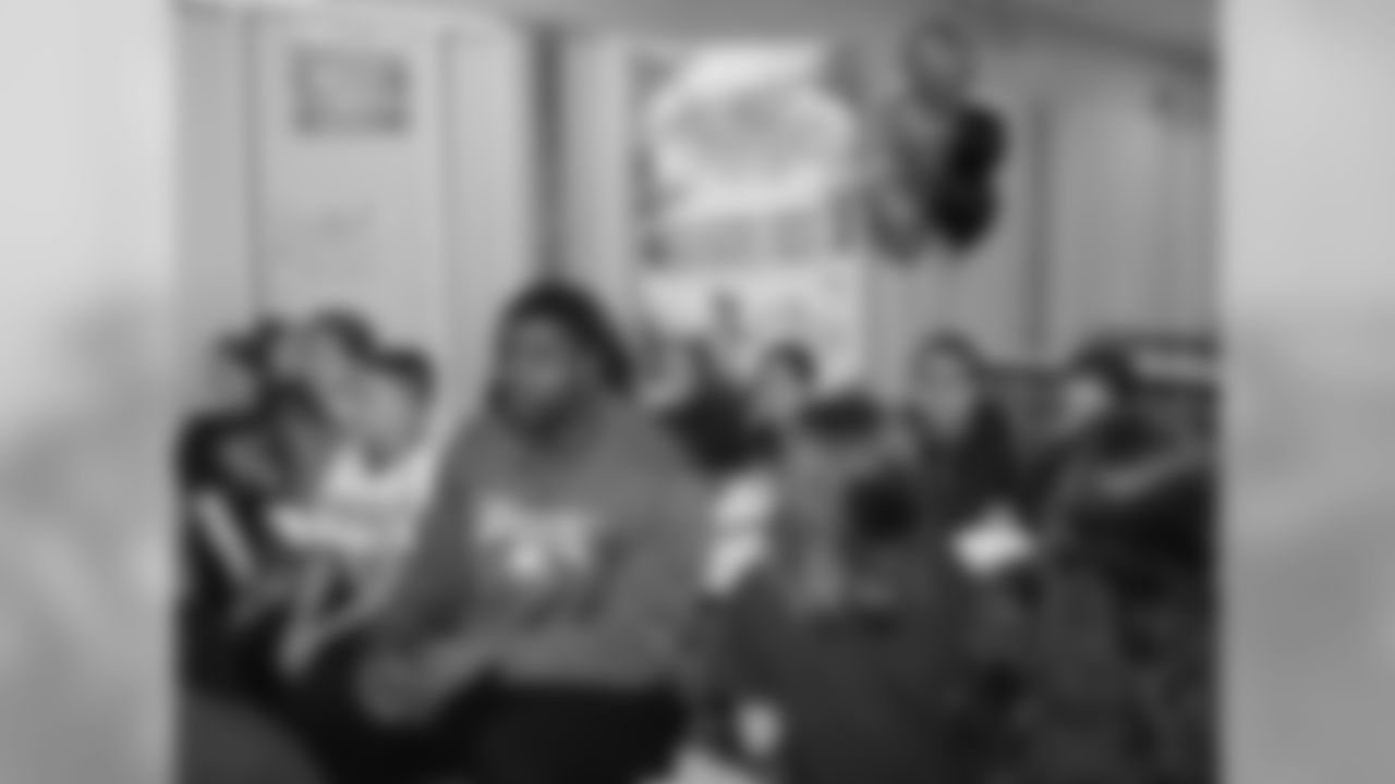 Vinny Curry sits down with some students