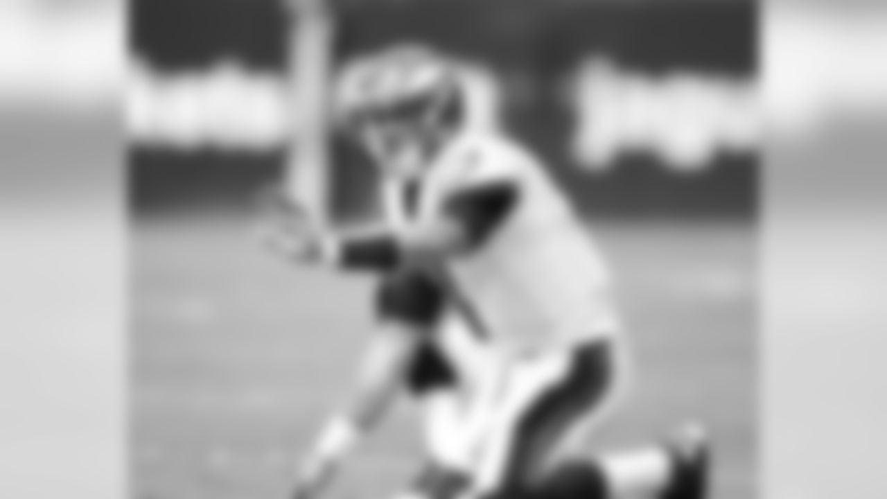 QB Mike Kafka takes his turn at holding