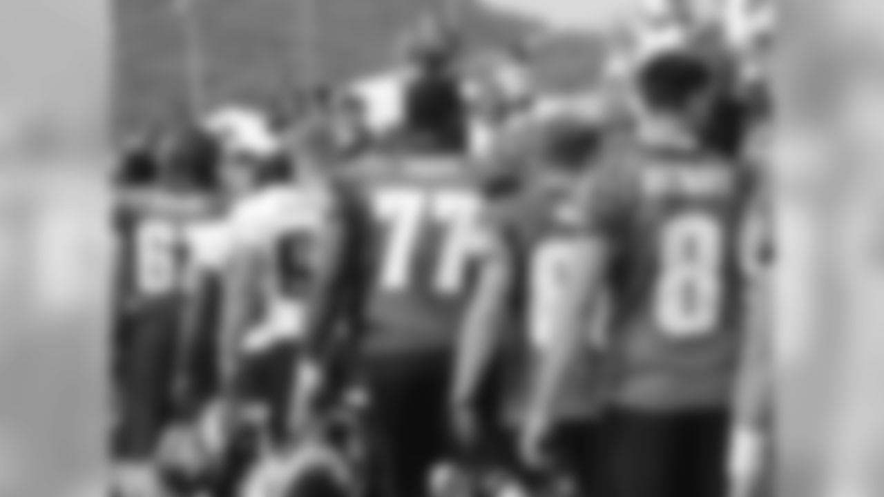 The Eagles walked around the fence to hi-five the fans following the final Training Camp practice