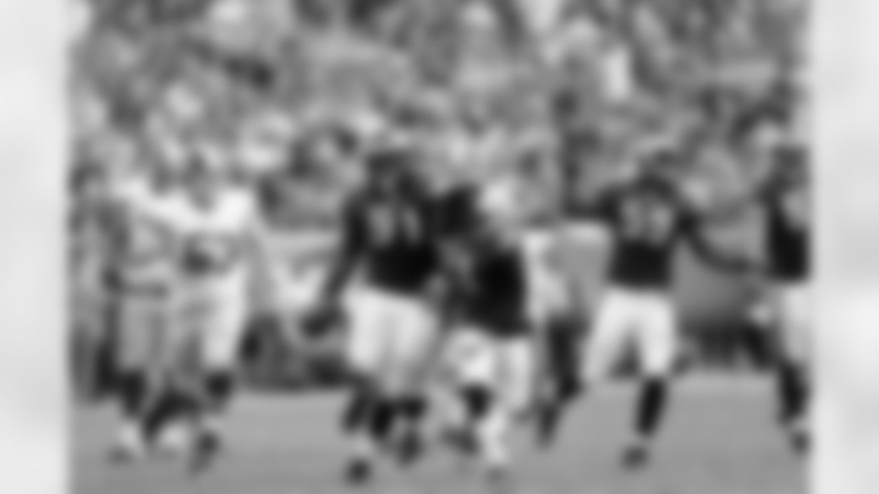 Eagles' DE Fletcher Cox and the rest of the defenders celebrate after a defensive stop.