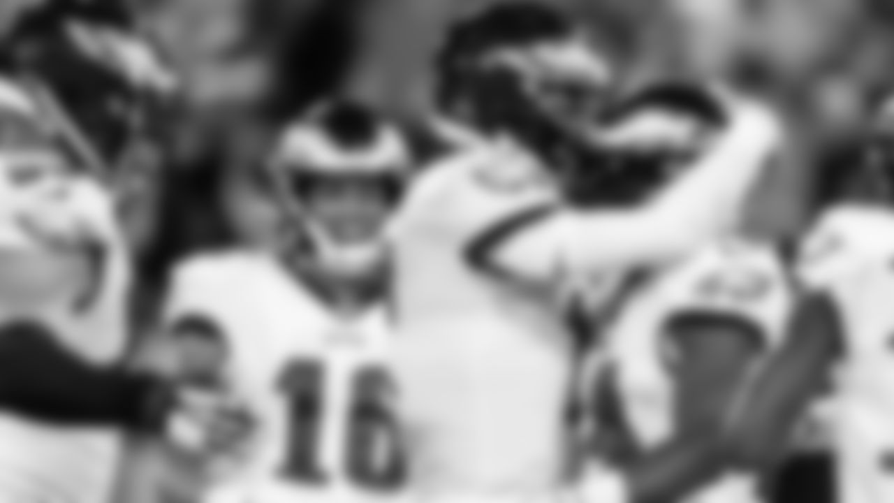 The offense celebrates in the end zone following RB Jordan Howard's touchdown
