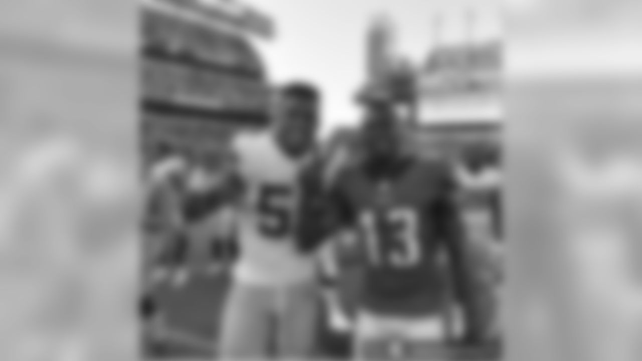 Nelson Agholor poses with Giants Devon Kennard after the Week 3 win.