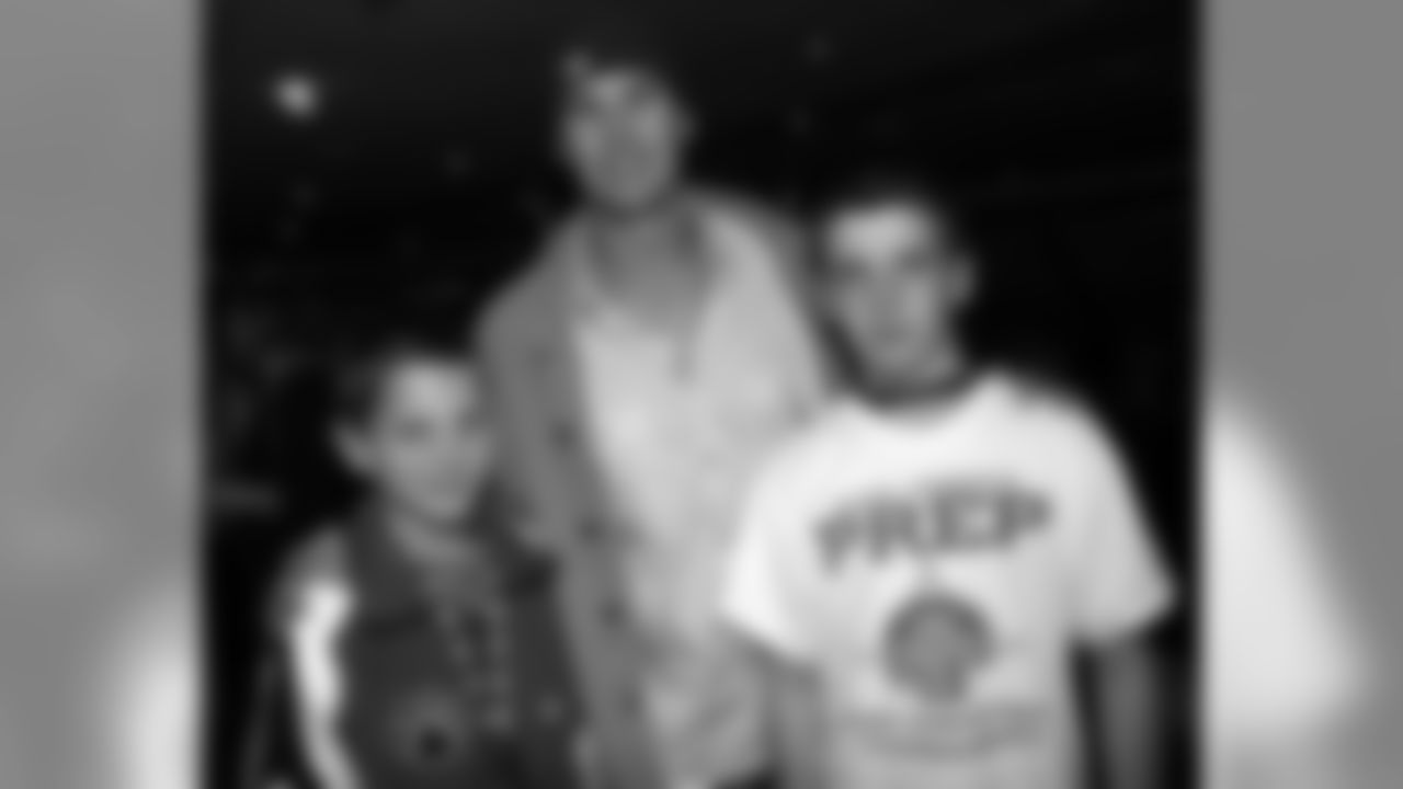 A.J. Feeley with a pair of young fans