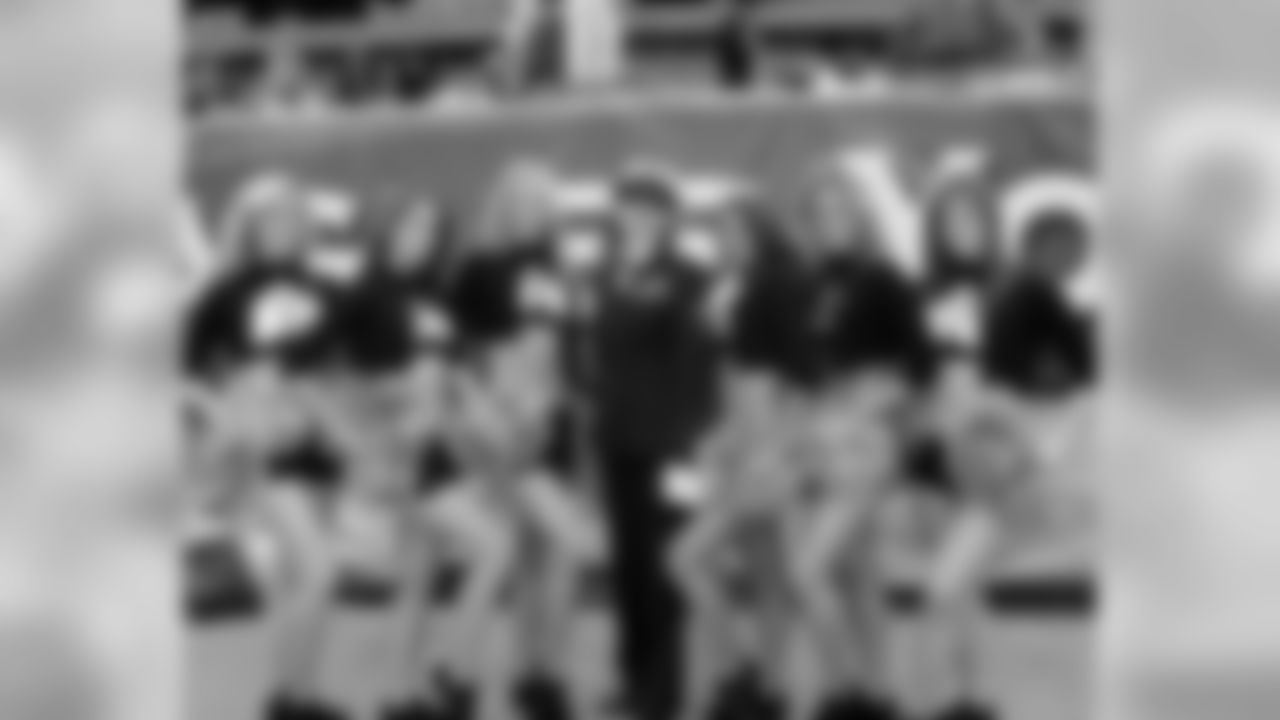Cheerleaders pose for a pre-game snapshot