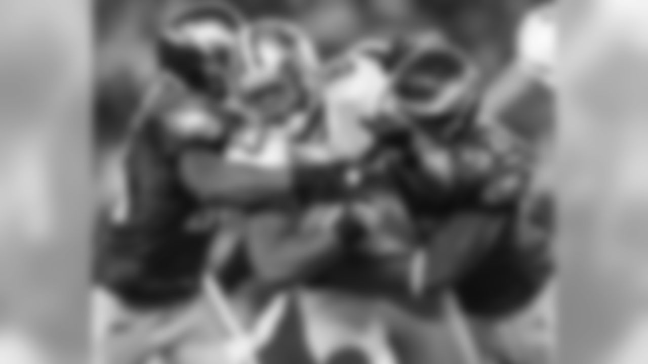 S Sean Jones and LB Tracy White on the tackle