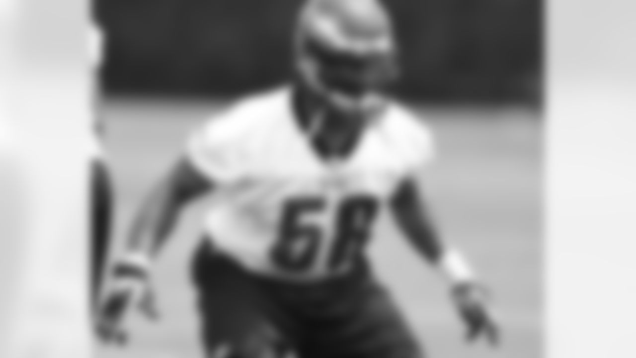 DE Trent Cole works on his game