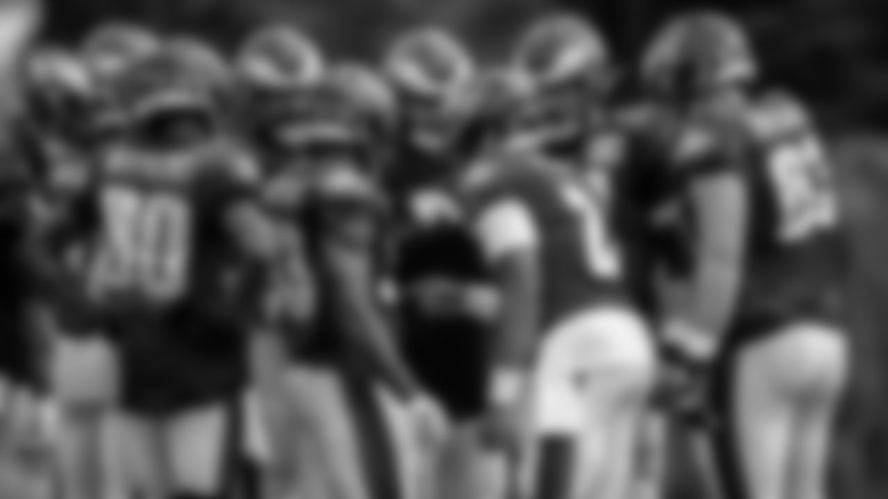 QB Jalen Hurts in the huddle