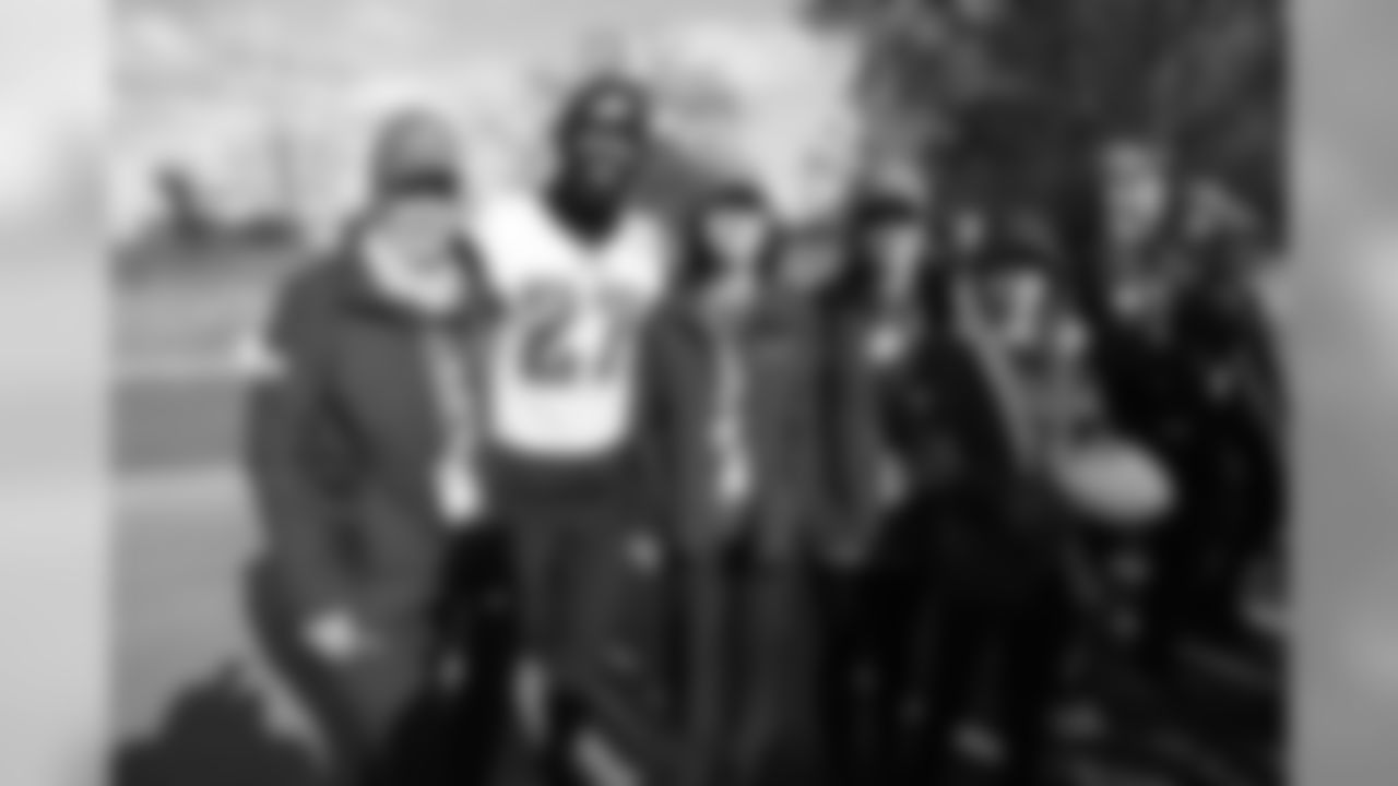 The Philadelphia Eagles visit with families of America's and England's fallen heroes on October 27 in London