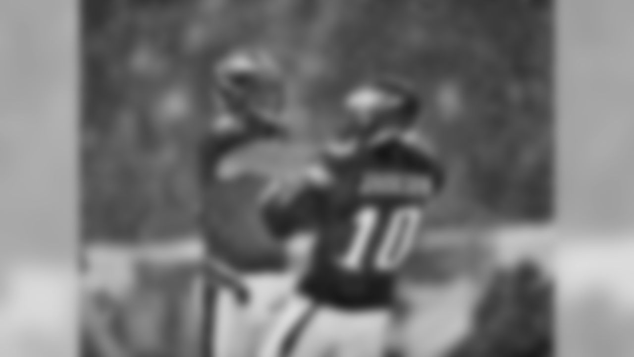 Eagles' WRs Riley Cooper (14) and DeSean Jackson (10) celebrate Cooper's 44-yard catch.