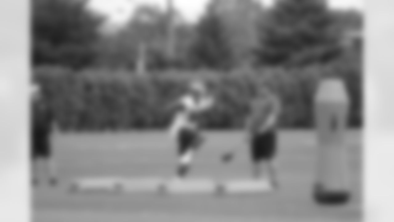 LB Marcus Smith works hard on the ladder