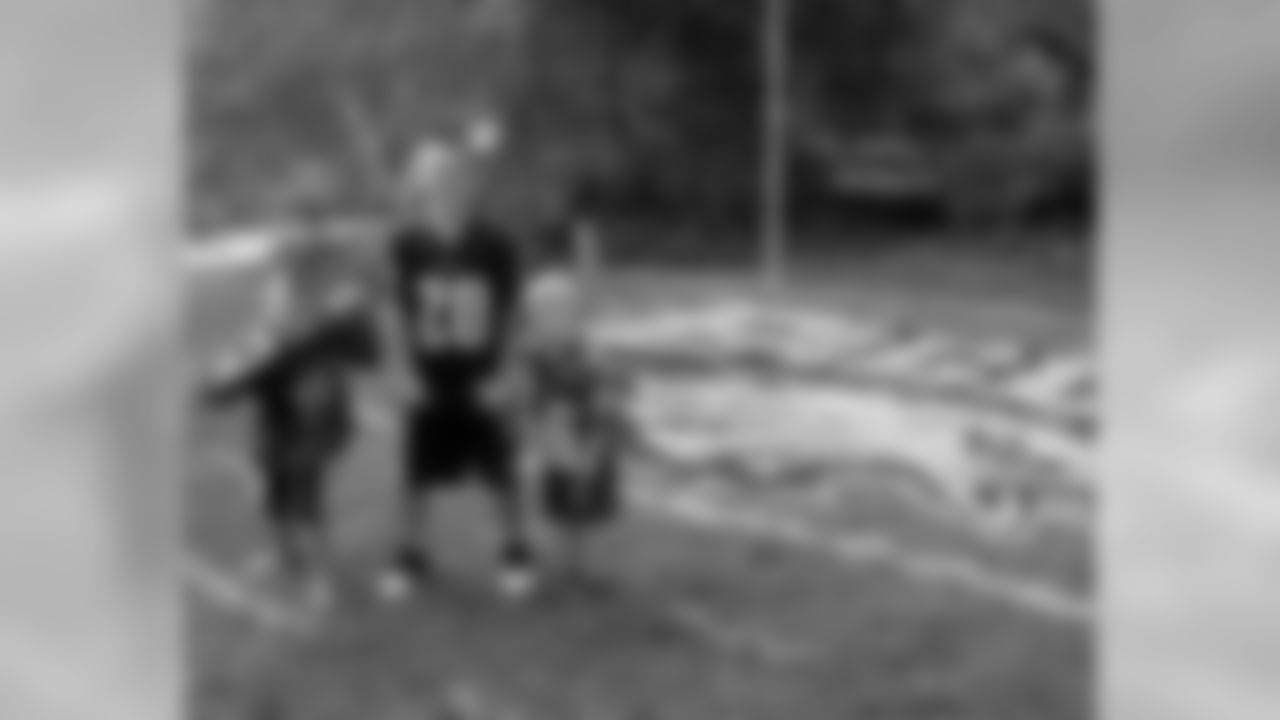 Spencer, Tucker & Cooper Blanchard on their backyard Eagles field in Medford Lakes, N.J.