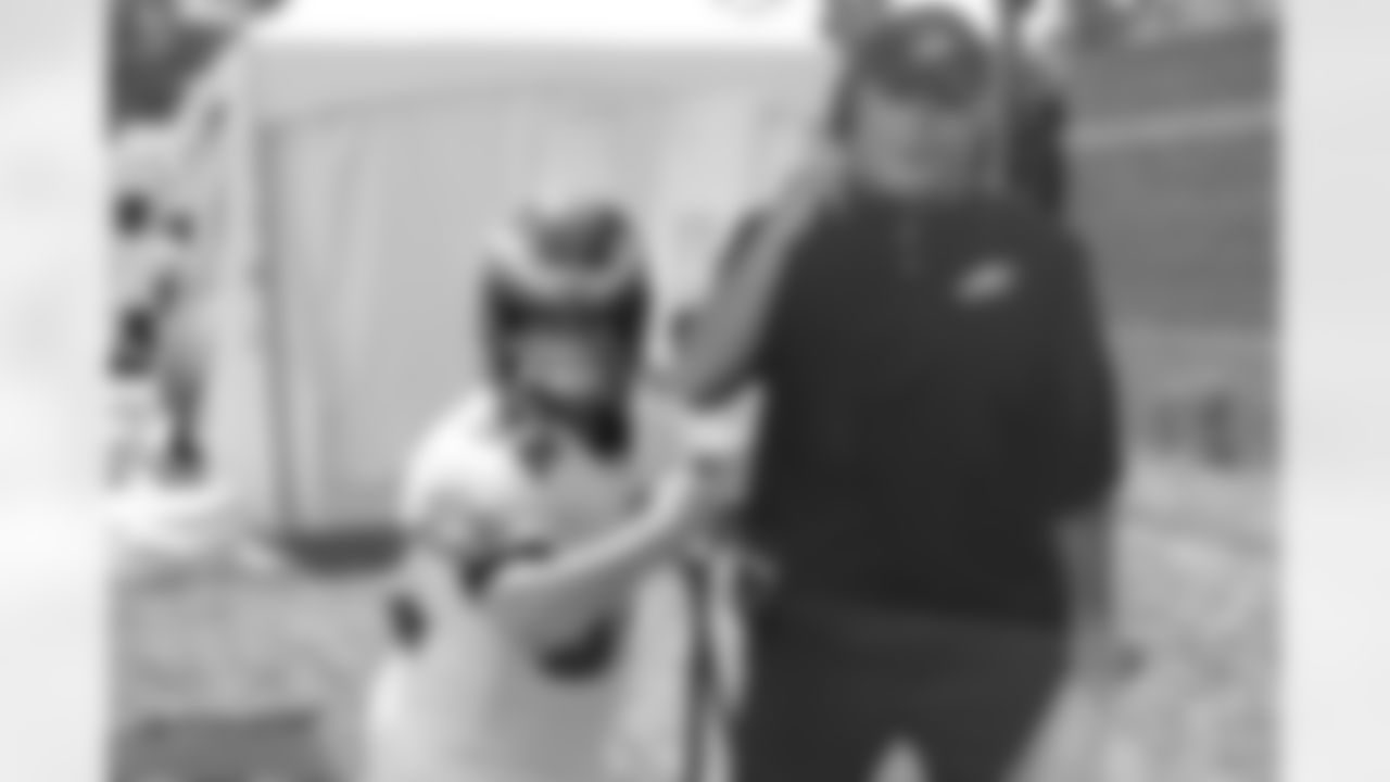 Fans got to try on equipment and pose with a cutout of Head Coach Chip Kelly