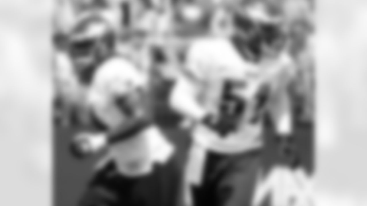 LBs Jeremiah Trotter and Takeo Spikes