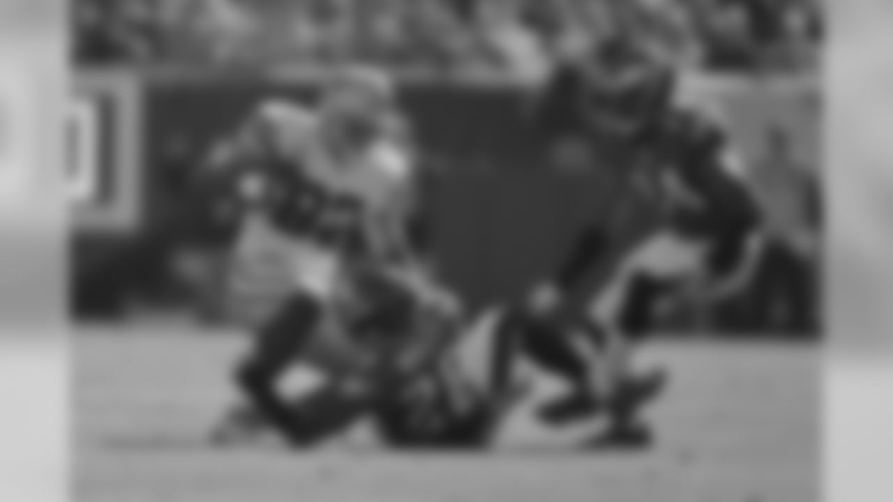 Eagles' safety Earl Wolff makes a tackle on Cowboys' TE Jason Witten.