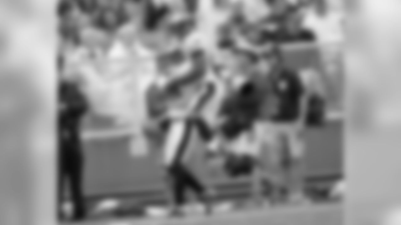 WR Jason Avant celebrates a big catch by WR Kevin Curtis
