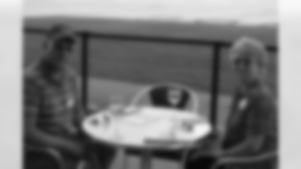 Two guests enjoying the patio at the NovaCare Complex