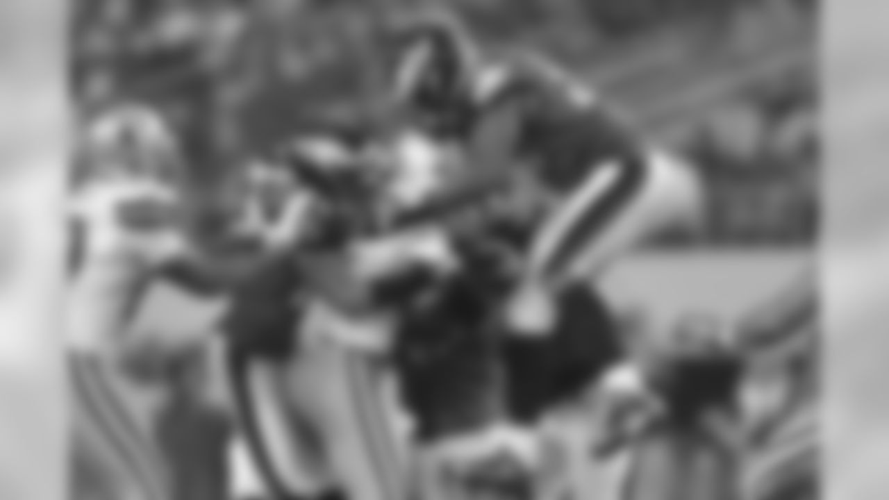 The defense makes a tackle