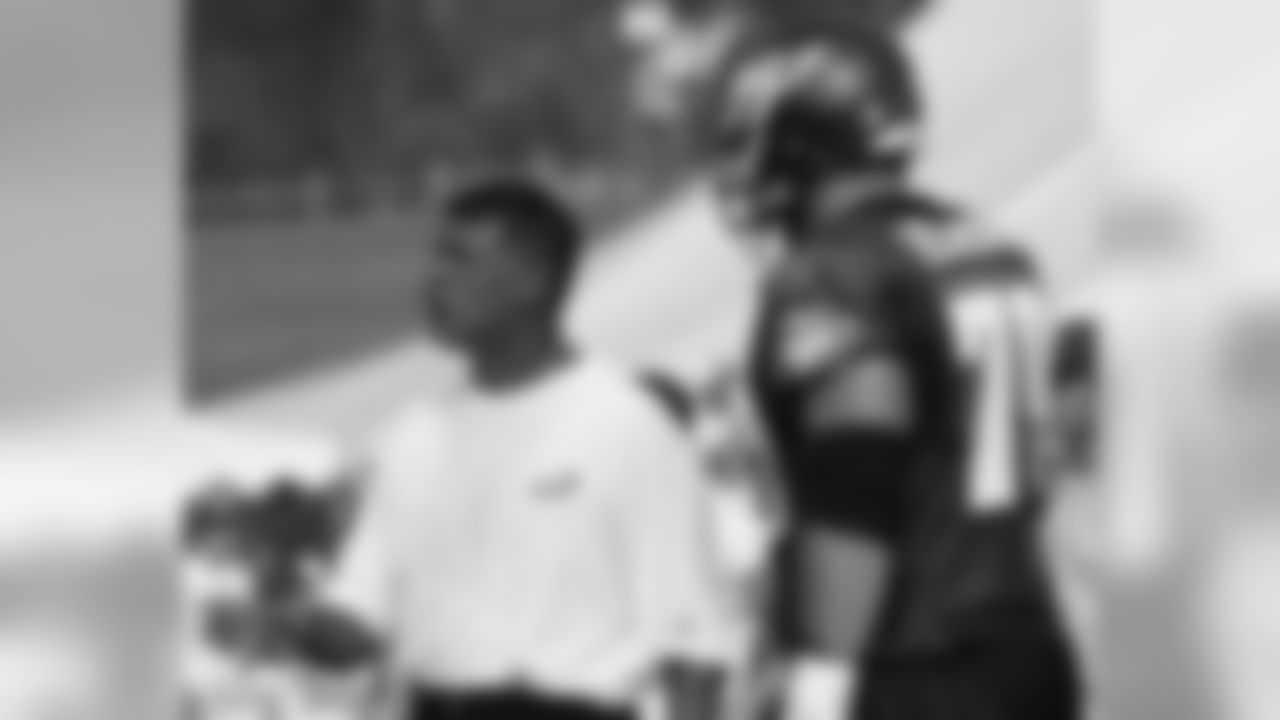 Offensive line coach Juan Castillo works with T Todd Herremans