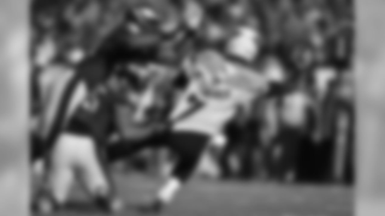 LB Mychal Kendricks grabbing the jersey of the quarterback just before the ball was thrown away